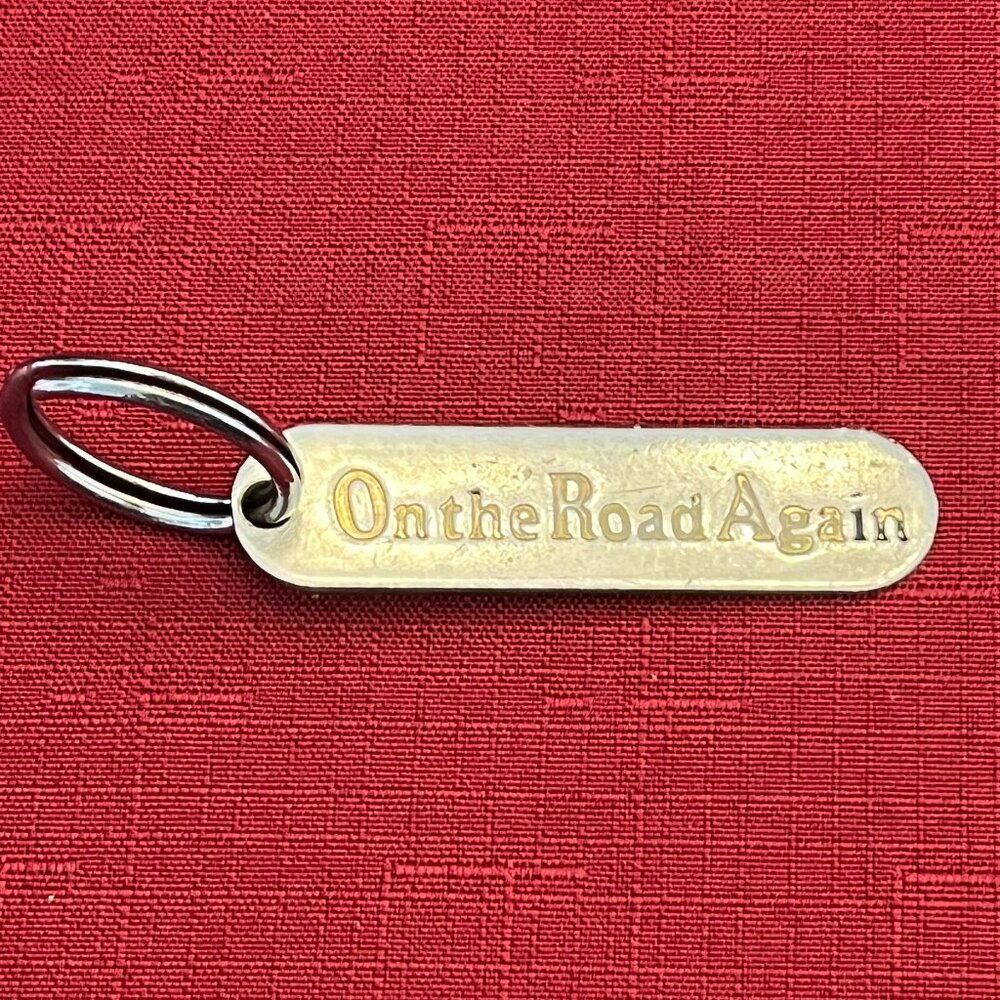 Vintage Russ Keychain Brass Metal "On The Road Again"